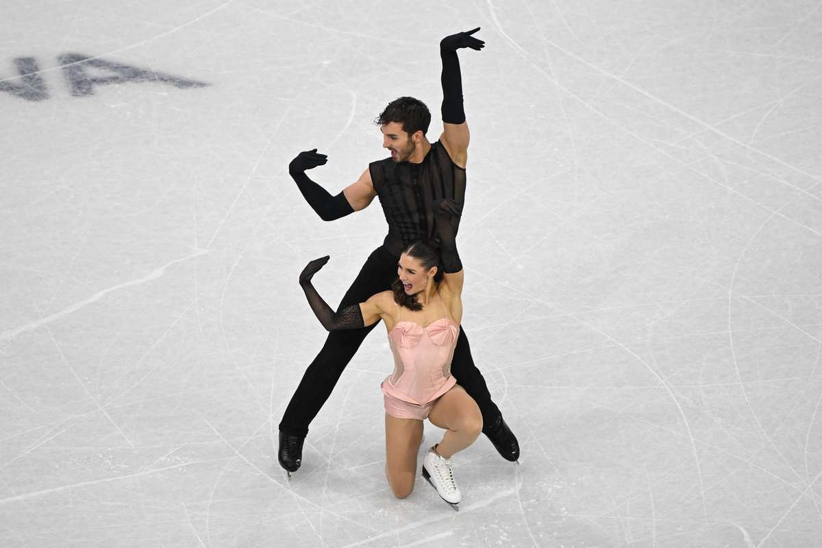 Vogue Madonna i a felicitat pe francezii care au castigat medalia de aur la proba de patinaj artistic de scurta durata la Olimpiada